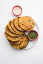 Palak Poori or spinach puri served with chutney, Indian food